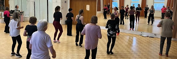 people dancing in a dance exercise class